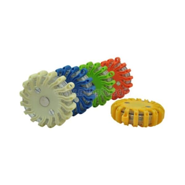 A set of colorful round LED emergency lights, with one standing and others stacked horizontally behind it.