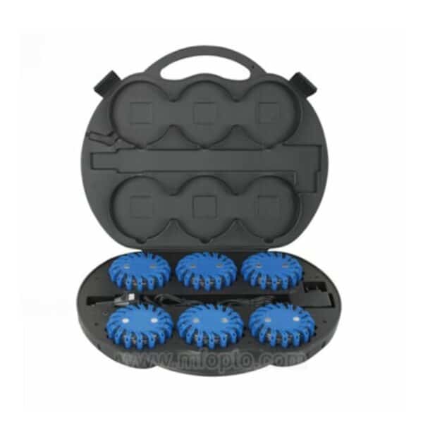 A handled hard case with six blue circular emergency flares in designated slots.