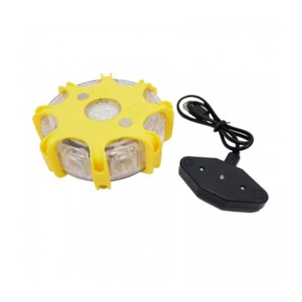 A yellow round LED road flare with rubber casing, includes black charging cable and plug adaptor.