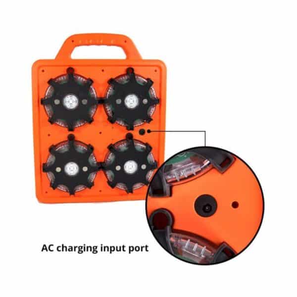 Orange device with four black circles and a handle, labeled "AC charging input port," with a close-up view of the port.