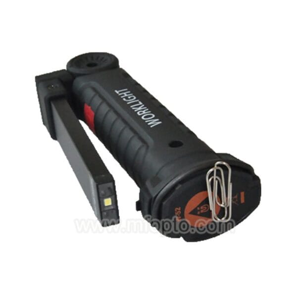 A black handheld work light with a paperclip on the base.