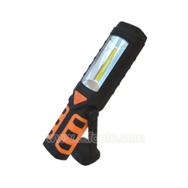 A compact black and red LED flashlight with a rectangular light panel and clip.