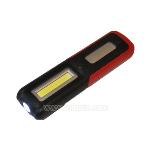 A compact handheld flashlight, rectangular, red and black casing, with an LED light.