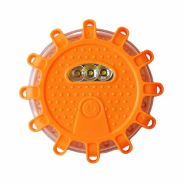Orange circular LED emergency flare with a textured surface and three central LEDs.