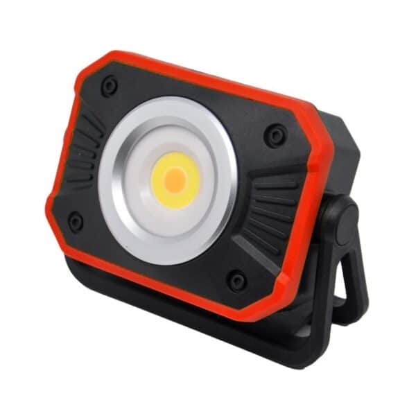 Compact rectangular LED work light with black and red casing, mounted on a swivel stand.