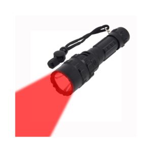 A black flashlight with a red beam and a black wrist strap.