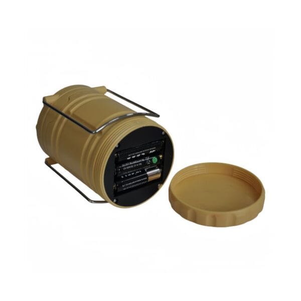 A cylindrical, light brown container with metal handles and a removed lid reveals electronic components and a control panel inside.