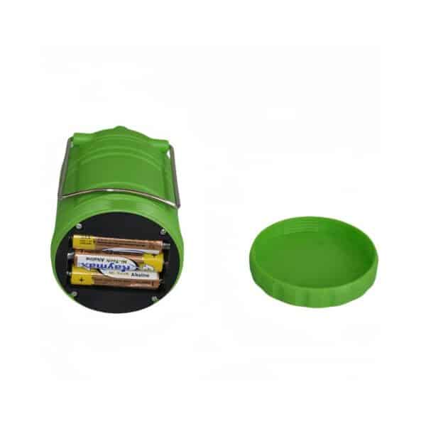 A lidless green cylinder filled with AA batteries.