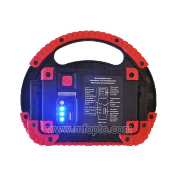A portable black and red device with a handle, blue-lit LED indicators, and a control panel with buttons and connectors.