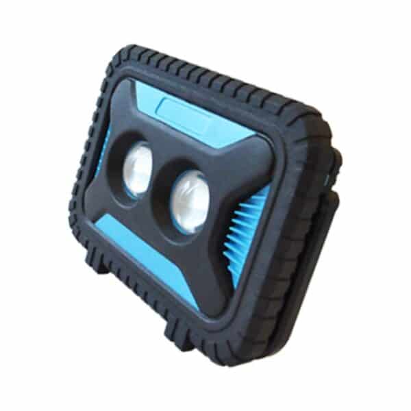 A rugged black and blue portable floodlight with two LED bulbs.