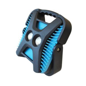 A blue and black handheld cleaning tool with grips and small bristles.