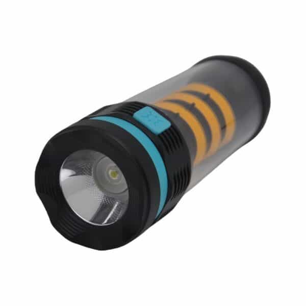 A black and turquoise handheld flashlight with a clear section showing an internal yellow coil.