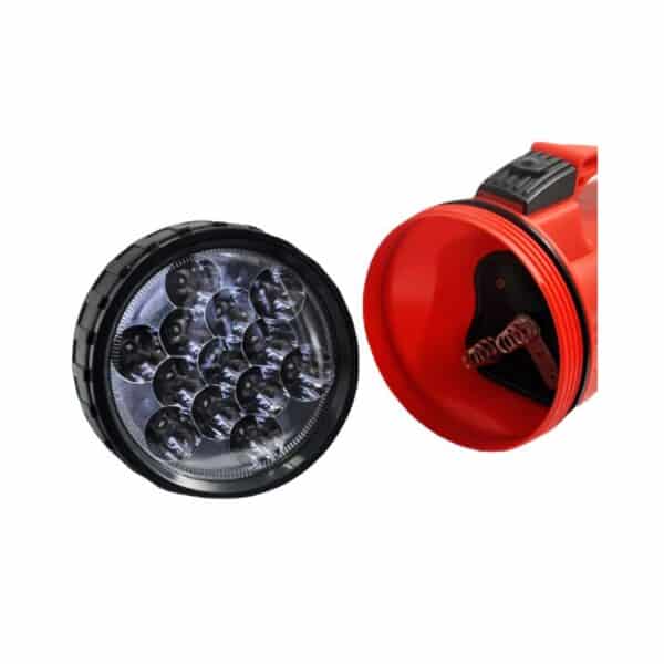 A flashlight with its cover off, exposing the bulb assembly and internal parts.