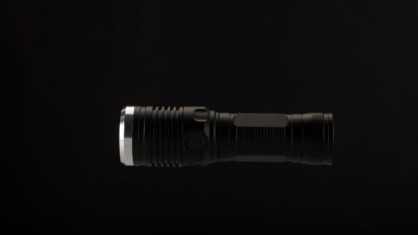 High-powered tactical flashlight with durable black metal finish, perfect for outdoor, emergency, and professional use. Compact, powerful LED lighting for versatile illumination.