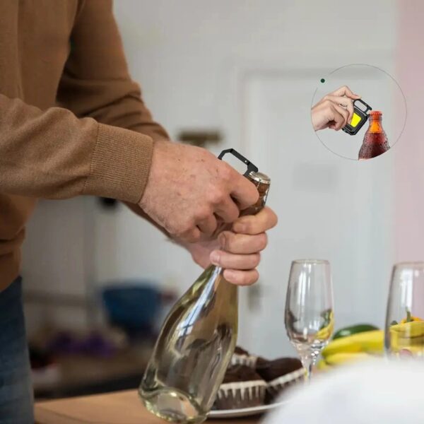 Person holding the compact WK1022 utility light in an indoor dining setting.