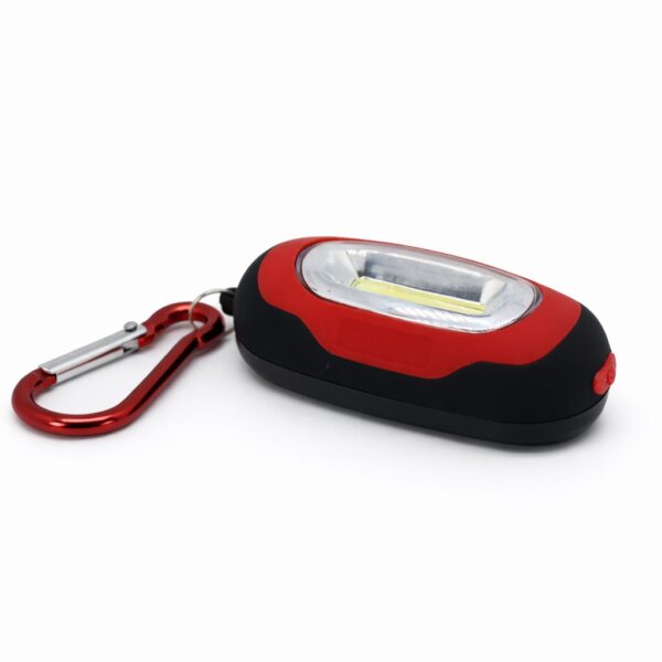 Compact magnetic COB keychain light with aluminum carabiner on a white background.